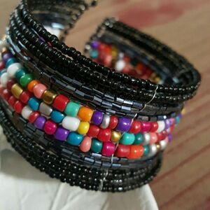Seed Beaded boho bracelet. Rainbow of colors bendable